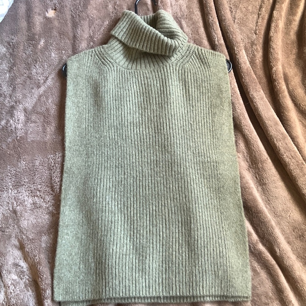 Sage green turtle neck tank style. Has open sides